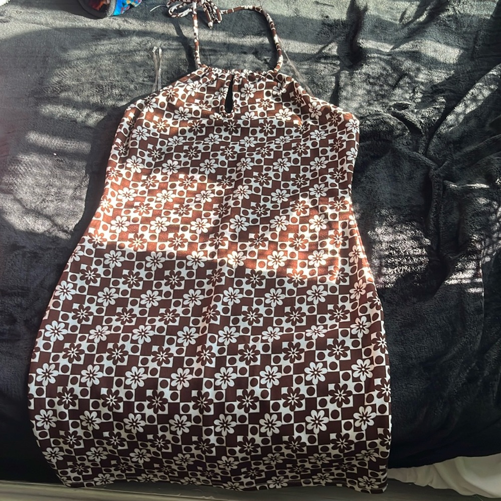 Open back body hugging brown floral print dress